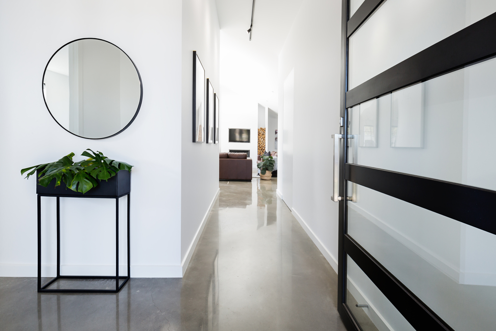 Contemporary,Home,Entry,Hall,With,Polished,Concrete,Floors